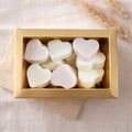 Whispering Woods Wax Melt Box (Approx. 100g) hand-poured Yorkshire wax melts with warm woody fragrance notes of sandalwood, patchouli, vanilla, bergamot and jasmine, vegan-friendly and phthalate-free home fragrance.